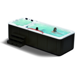couple enjoying swim spa